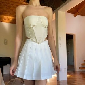 White pleated skirt